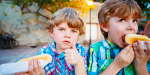 kids eating hot dogs back to school